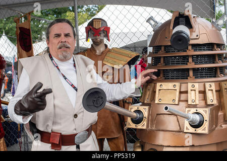 New York, USA, 22nd September, 2018 Thomas Jewell discribes how he created his motorized Dalek costume at the World Maker Faire in New York City. He can control the costume from inside and has a voice modulator that allows him to sound like a member fictional race from the Dr. Who television series. The festival is a two day event that includes exhibits, workshops and talks on making and the DIY culture. This year included a section focused on cosplay, a form of performance art using costumes.  Credit: L.A. Faille/Alamy Live News Stock Photo