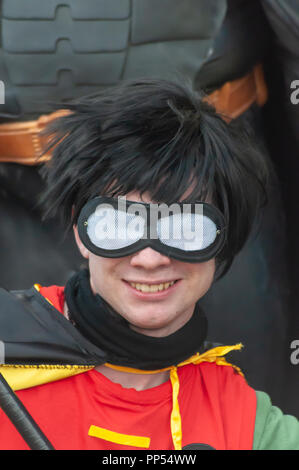 Glasgow, Scotland, UK. 23rd September, 2018. A cosplayer dressed as the fictional superhero Robin, Batman and Robin, from the comic books published by DC Comics, arriving on day two of the MCM Scotland Comic Con held at the SEC Centre. Credit: Skully/Alamy Live News Stock Photo