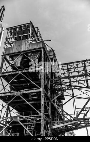 black and white image of the metal structure of an abandoned factory in the city of Rotterdam in the Netherlands Holland Stock Photo
