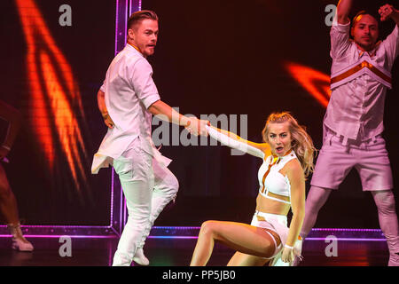 MOVE BEYOND Live on Tour performs in North Carolina.  Move Beyond the Tour is the creation of Julianne and Derek Hough.   Julianne Alexandra Hough is an American dancer, singer, and actress.  Derek Hough is an American professional Latin and ballroom dancer, choreographer, actor and singer. Stock Photo