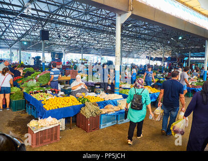 Bodrum, Turkey - July 6, 2018. Citizens shopping in Bodrum market, Kapalı Pazar Yeri, at downtown. Mugla Province, Turkey. Stock Photo