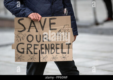 Save our greenbelt, countryside campaigner with a cardboard sign at the Labour Party Conference, Liverpool, UK Stock Photo