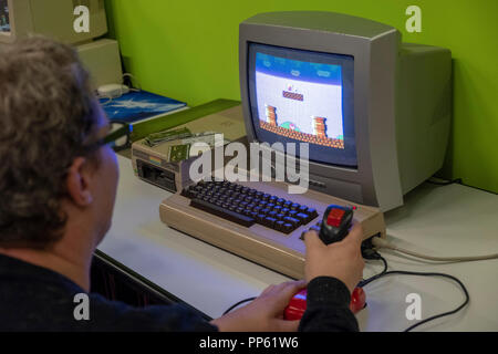 old Commodore 64 computer at the world's largest trade fair for computer and video games Gamescom in Cologne, Germany on 24.8.2018 Stock Photo
