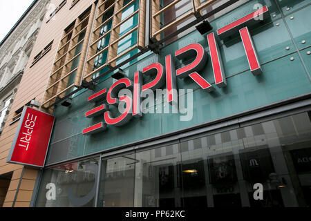 A logo sign outside of a Esprit retail store in Munich, Germany, on September 2, 2018. Stock Photo