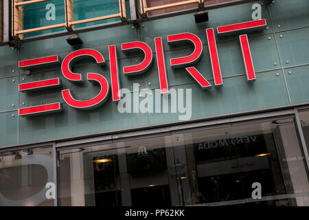 A logo sign outside of a Esprit retail store in Munich, Germany, on September 2, 2018. Stock Photo