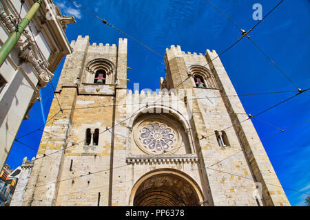 Lisbon, Colorful Alfama streets and churches overlooking historic city center Stock Photo