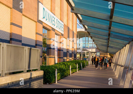 Blanchardstown, Dublin, Ireland. 23rd Sept 2018: Entrance to Blanchardstown Shopping Centre with Dunnes Stores logo sign visible on the side wall. Stock Photo