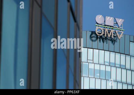 A logo sign outside of the headquarters of OMV AG in Vienna, Austria, on September 6, 2018. Stock Photo