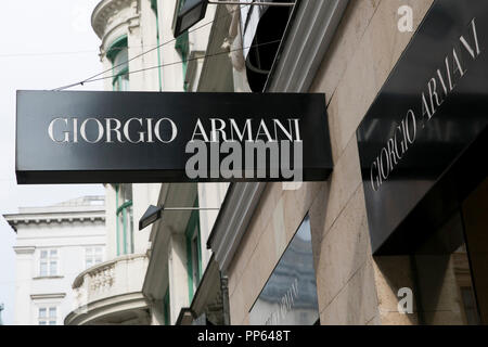 A logo sign outside of a Giorgio Armani retail store in Vienna Austria