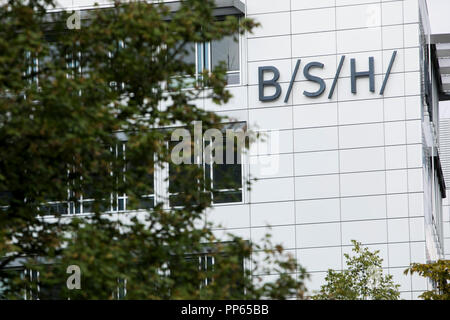 A logo sign outside of the headquarters of BSH Hausgeräte GmbH (BSH ...