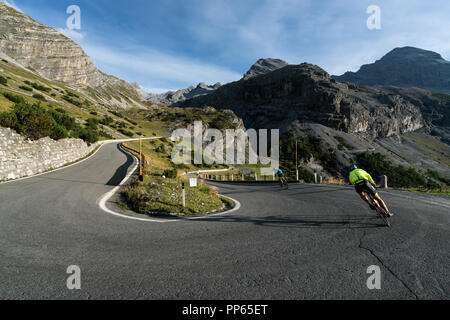 Road cycling at winding road of Stelvio Pass near Bormio, Italy, Europe, EU Stock Photo