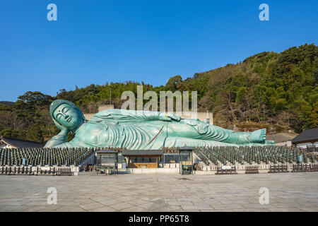 Fukuoka, Japan - February 8, 2018: Nanzo-in temple in Fukuoka, Japan with the largest bronze reclining buddha statue in the world Stock Photo