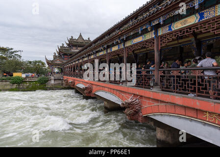 Dujiangyan, Chengdu, Sichuan Province, China - Oct 10, 2017: LanQiao bridge with dragon decorations over PuYangHe river Stock Photo