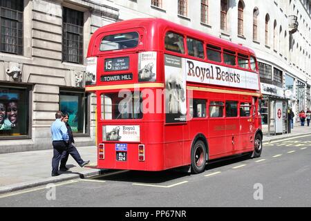 LONDON, UK - MAY 13, 2013: People ride London Bus in London. As of 2012, LB serves 19,000 bus stops with a fleet of 8000 buses. On a weekday 6 million Stock Photo