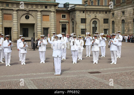 STOCKHOLM - JUNE 1: Royal Swedish Navy Cadet Band performing on June 1, 2010 in Stockholm, Sweden. The performances during famous change of guard gath Stock Photo