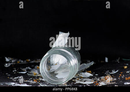 Shot in studio on glass against black background with flash light. Stock Photo