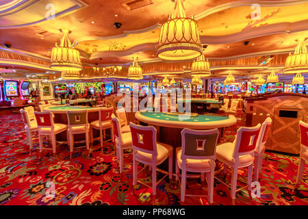 Las Vegas, Nevada, United States - August 18, 2018: blackjack tables and slot machine inside the luxurious Wynn Las Vegas Resort Hotel, a 5-star, themed Paradise in Las Vegas Strip. Stock Photo