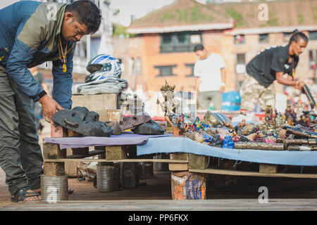 Kathmandu,Nepal - Sep 8,2018: Vendors Getting ready with displaying  tourist Souvenirs at Basantapur durbar Square,Kathmandu. Stock Photo