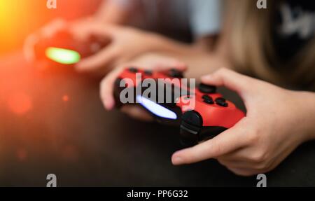 Children playing video games Stock Photo