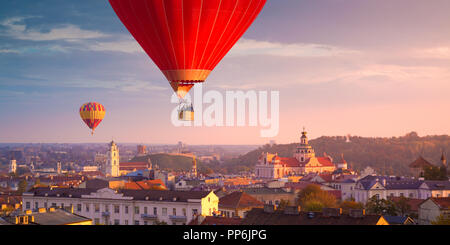 Hot air balloons flying over Vilnius Stock Photo