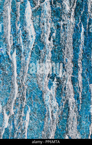 Inverted image of a Ponderosa pine tree bark, close up of ridges and growth patterns. Blue and silver colours. Stock Photo