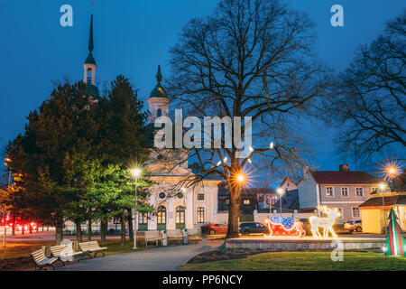 Parnu, Estonia. Night View Of Old St. Catherine's Church Is Russian Orthodox Church. Famous Attraction Landmark In Evening Night Christmas Illuminatio Stock Photo