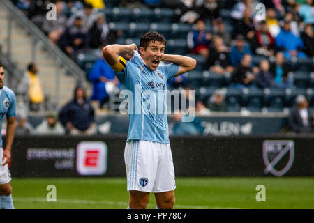 Chester, PA, USA. 23rd Sept, 2018. Sporting Kansas City captain Matt Besler (5) shouts out directions while fixing his collar. © Ben Nichols/Alamy Live News Stock Photo