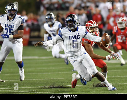 Santa Ana, CA. 21st Sep, 2018. IMG Academy Ascenders quarterback David Baldwin #5 runs in the first half of the Prep Football game Mater Dei High School vs. IMG Academy Ascenders, in Santa Ana, California.Photo © Louis Lopez /Modern Exposure/Cal Sport Media/Alamy Live News Stock Photo