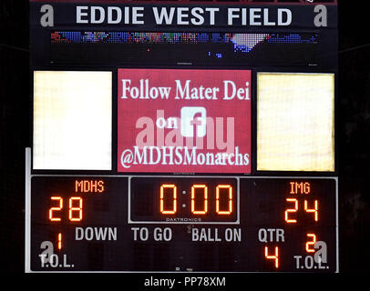 Santa Ana, CA. 21st Sep, 2018. Final view of the scoreboard as the Mater Dei Monarchs defeat the IMG Academy Ascenders 28-24.Mater Dei High School vs. IMG Academy Ascenders, in Santa Ana, California.Photo © Louis Lopez /Modern Exposure/Cal Sport Media/Alamy Live News Stock Photo