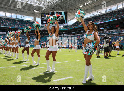 Miami Gardens, Florida, USA. 23rd Sep, 2018. The Miami Dolphins cheerleaders perform at the start of a NFL football game between the Oakland Raiders and the Miami Dolphins at the Hard Rock Stadium in Miami Gardens, Florida. Credit: Mario Houben/ZUMA Wire/Alamy Live News Stock Photo