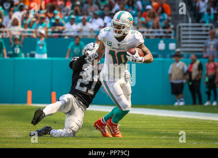 Miami Gardens, Florida, USA. 23rd Sep, 2018. Miami Dolphins wide receiver Kenny Stills (10) runs with the ball past Oakland Raiders cornerback Gareon Conley (21) during a NFL football game between the Oakland Raiders and the Miami Dolphins at the Hard Rock Stadium in Miami Gardens, Florida. Credit: Mario Houben/ZUMA Wire/Alamy Live News Stock Photo