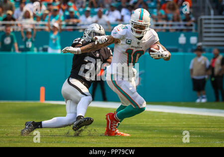 Miami Gardens, Florida, USA. 23rd Sep, 2018. Miami Dolphins wide receiver Kenny Stills (10) runs with the ball past Oakland Raiders cornerback Gareon Conley (21) during a NFL football game between the Oakland Raiders and the Miami Dolphins at the Hard Rock Stadium in Miami Gardens, Florida. Credit: Mario Houben/ZUMA Wire/Alamy Live News Stock Photo