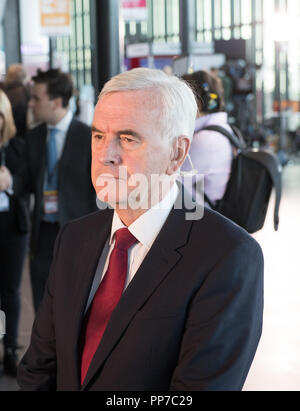 Labour Party Annual Conference 2018, Albert Docks, Liverpool, England, UK. 24th. September, 2018. John McDonnell M.P. Shadow Chancellor talking to the t.v. and press before his major speech at the Labour Party Annual Conference 2018. Alan Beastall/Alamy Live News Stock Photo