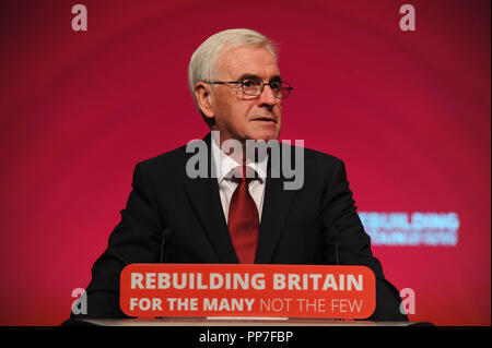 Liverpool, UK. 24th Sep, 2018. John McDonnell MP, Shadow Chancellor, delivering his keynote speech on the theme of Private Investment and Ownership, on the morning session of the second day of the Labour Party annual conference at the ACC Conference Centre. Credit: Kevin Hayes/Alamy Live News Stock Photo