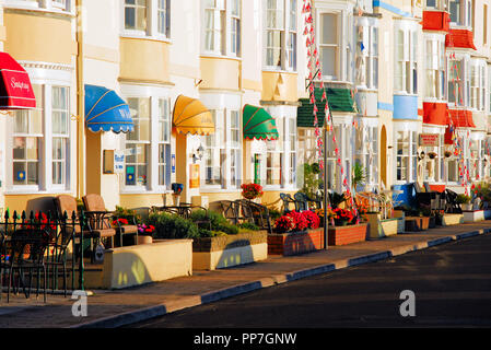 Weymouth. 24th September 2018. UK Weather: Colourful Weymouth B&Bs in the early morning sunshine Credit: stuart fretwell/Alamy Live News Stock Photo