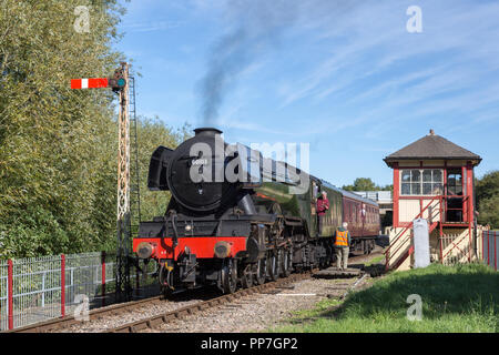 Peterborough, United Kingdom. 24th August 2018. Flying Scotsman, the world's most famous steam locomotive, arrives at Orton Mere Station on the Nene Valley Railway. The Sir Nigel Gresley designed locomotive will be hauling trains between Wansford and Peterborough Nene Valley stations at the line's sold out event this coming weekend. Credit: Andrew Plummer/Alamy Live News Stock Photo