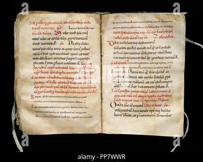 Pontifical of Vic. Parchment manuscript dated in the firts half of the 12th century, from the scriptorium of the Cathedral of Vic. Carolingian lower case. Rubric red letters and simple initials. Episcopal Museum of Vic. Catalonia. Spain. Stock Photo