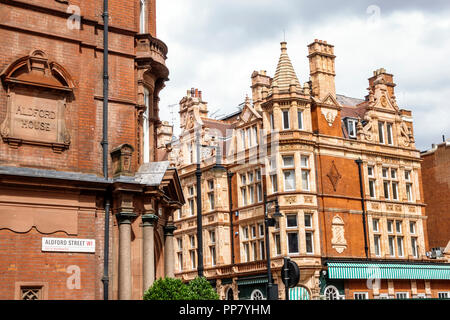 London England,UK,West End City Westminster Mayfair,Park Lane,Aldford House,South Audley Street,historic buildings,residential street neighborhood,red Stock Photo