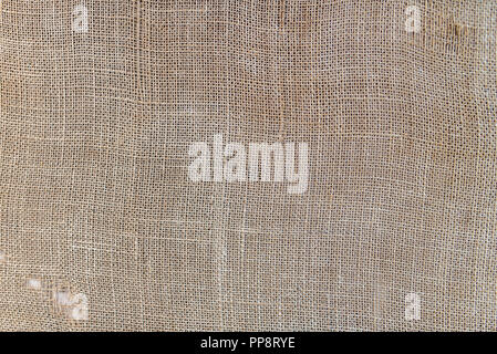 Close up of a old woolen fabric of beige color. Stock Photo