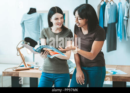 Pretty girls talking about fashion Stock Photo