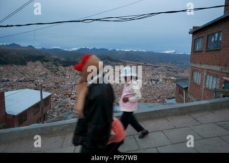 Slums El Alto with views of the sea of Bolivia's capital La Paz. In the multi-purpose sports hall Anden Secrets on Plaza San Pedro in El Alto, above Bolivia's capital La Paz, where on every Sunday afternoon, the main attraction is the Cholitas Wrestling. Stock Photo