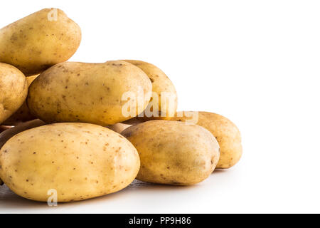 A pile washed potatoes isolated on white background. Stock Photo