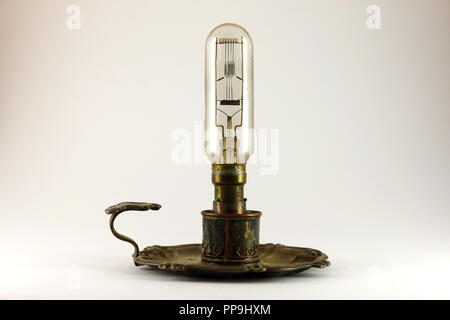 Large old radio valve on white background Stock Photo