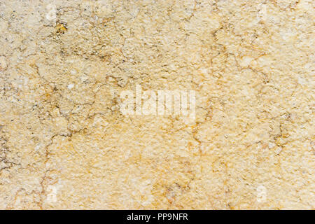 Natural yellow stone background. For design and networking. Stock Photo