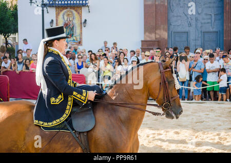 Female equestrian. Annual event, Day of the horses, celebration, event, Fuengirola, Málaga, Andalusia, Spain. September 2018 Stock Photo