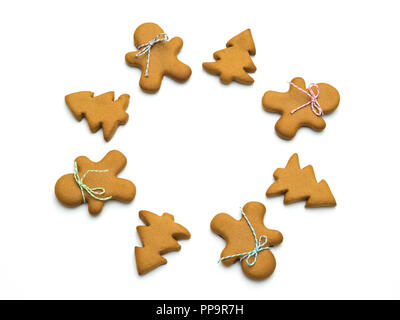 Christmas cookies isolated on white background. Christmas baking. Making gingerbread christmas cookies. Christmas concept. Stock Photo