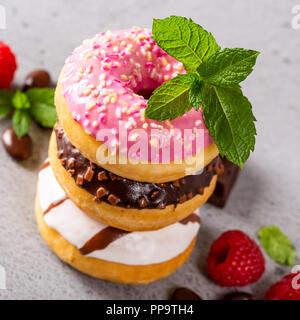 Stack of colorful donuts Stock Photo