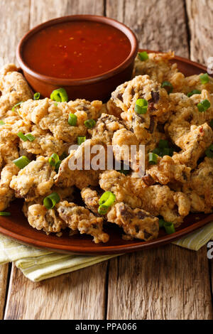 Battered chicken served with sauce Stock Photo - Alamy