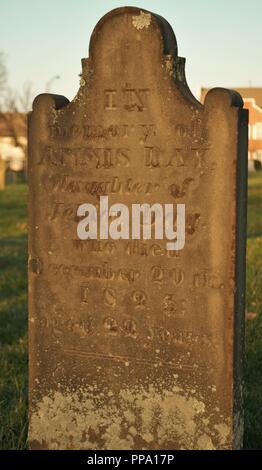 very old broken statue / headstone in a cemetery Stock Photo