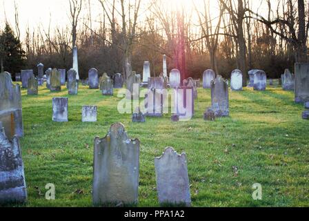 very old broken statue / headstone in a cemetery Stock Photo